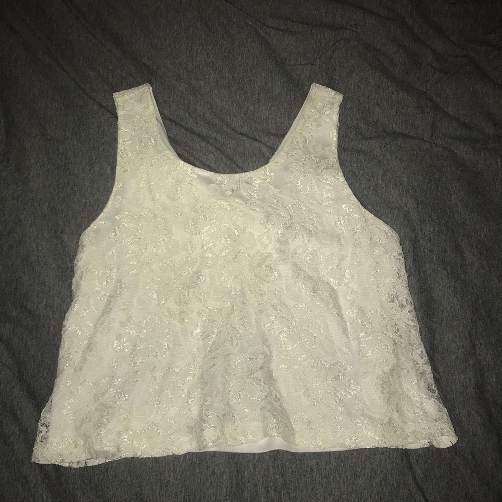 lace white crop tank with bow in back.